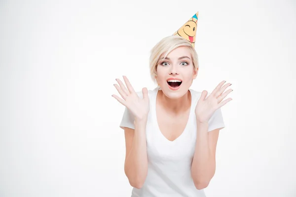 Happy amazed woman in party hat looking at camera — Stock Photo, Image