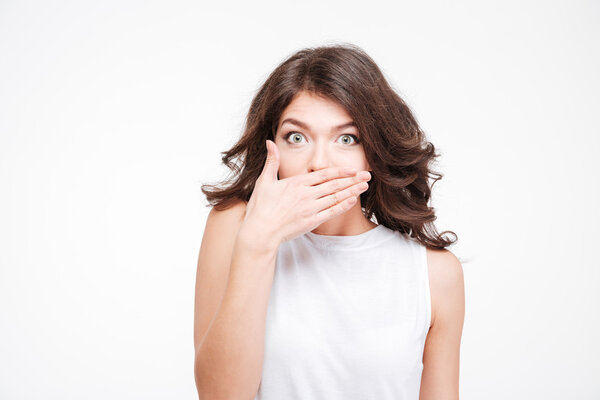 Woman covering her mouth with palm