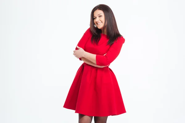 Glückliche süße Frau im roten Kleid — Stockfoto
