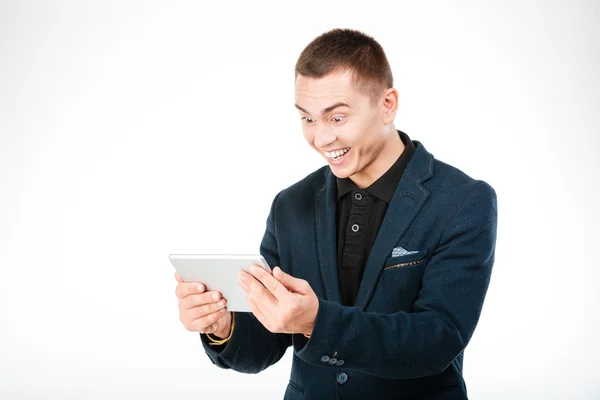 Vrolijke zakenman met behulp van tablet pc — Stockfoto