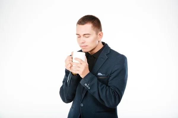 Homme d'affaires tenant tasse avec thé — Photo