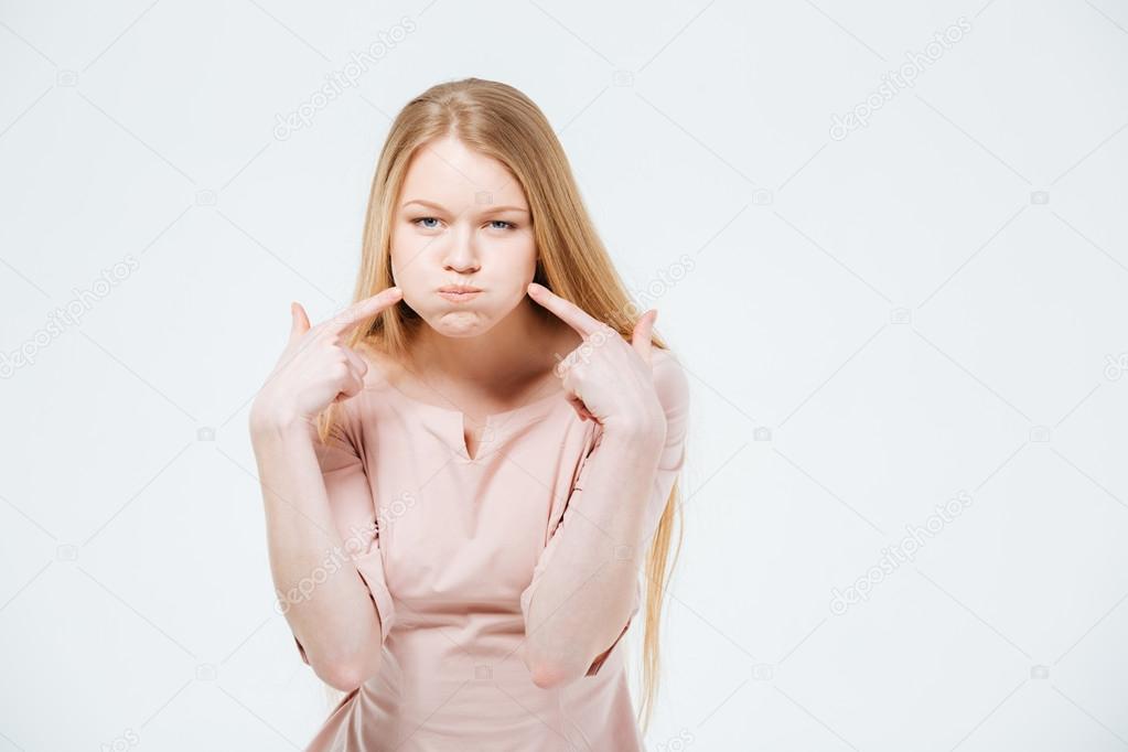 Woman with inflated cheeks