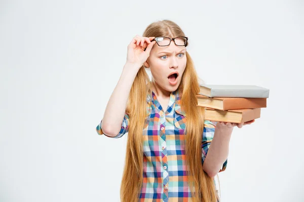 Moe vrouwelijke student houden van boeken — Stockfoto