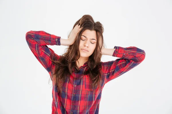 Sad depressed young woman with hands on head having headache — Stock Photo, Image