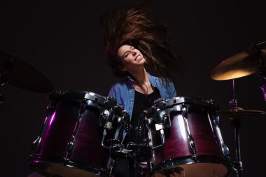 Drummer playing the drums clipart
