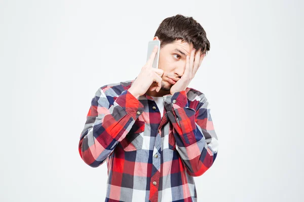 Stressed casual man talking on the phone — Stock Photo, Image