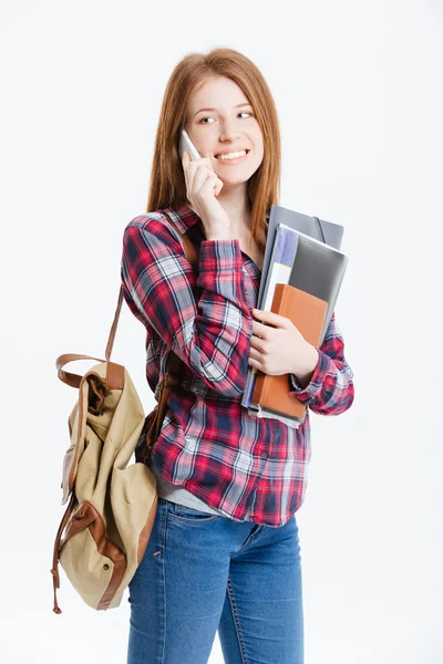 Happy female student talking on the phone — Stock Photo, Image