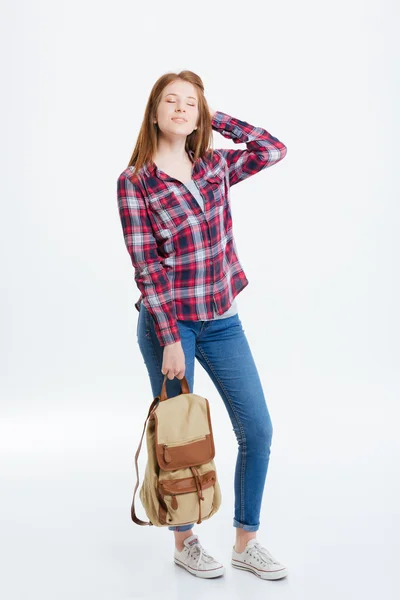 Full length portrait of relaxed woman with backpack — Stock Photo, Image