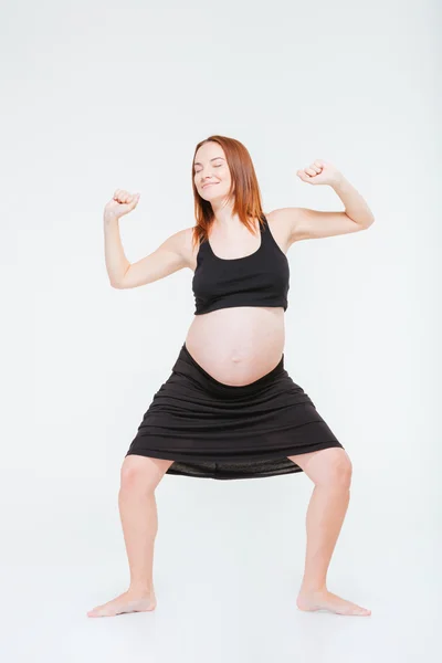 Full length portrait of a happy redhead woman — Stock Photo, Image