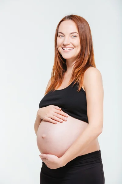 Mujer embarazada sonriente — Foto de Stock