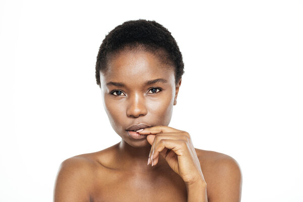 Pensive afro american woman looking at camera isolated on a white background