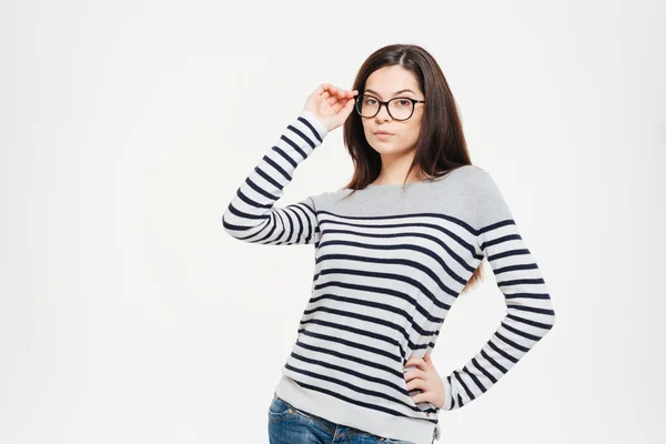 Serious woman in glasses looking at camera — Stock Photo, Image