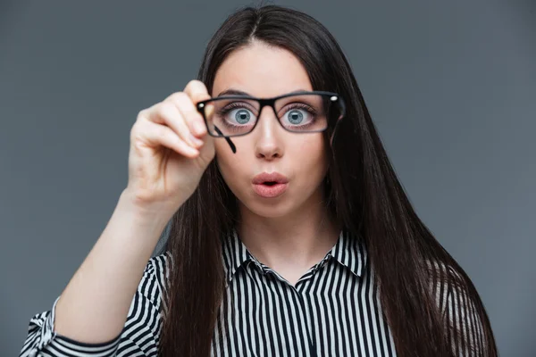 Funny woman holding glasses — Stock Photo, Image