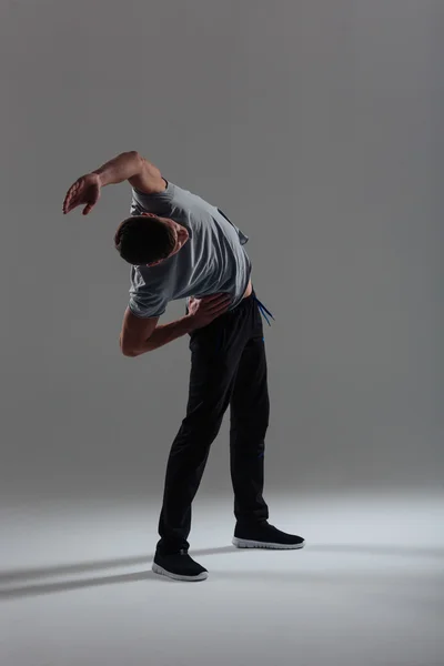 FItness man doing stretching exercises — Stock Photo, Image