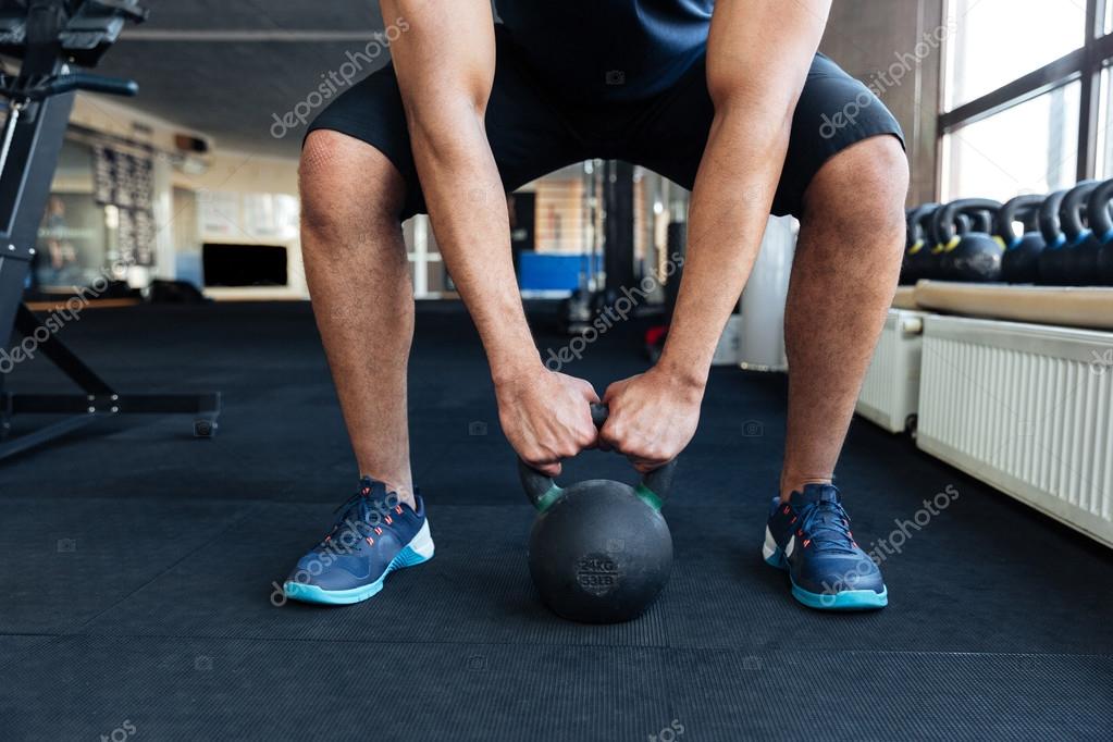 Bodybuilder working out with kettlebell — Stock Photo © Vadymvdrobot