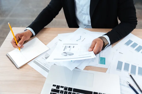 Close-up portrait of hands holding documents — Stock Photo, Image