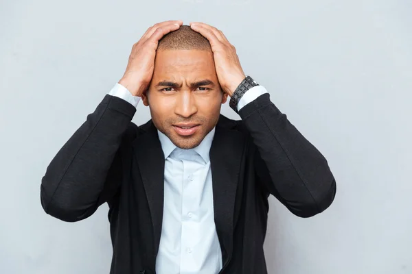 stock image Closeup portrait of unhappy upset guy isolated on gray background