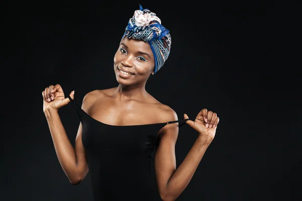 Portrait of a charming african woman in bodysuit posing — Stock Photo, Image