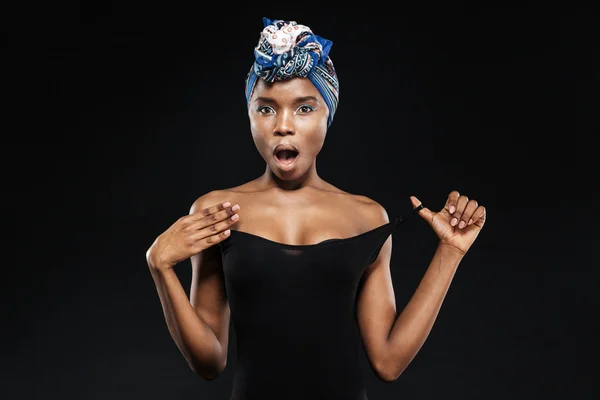 Surprised african woman with beautiful body in black bodysuit — Stock Photo, Image