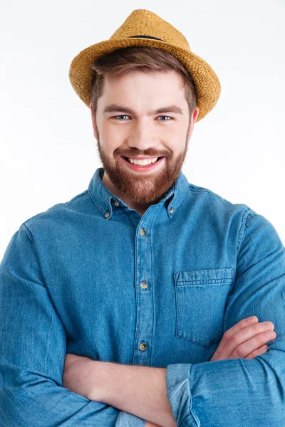Close-up portrait of man with crossed hands wearing hat — Stock Photo, Image