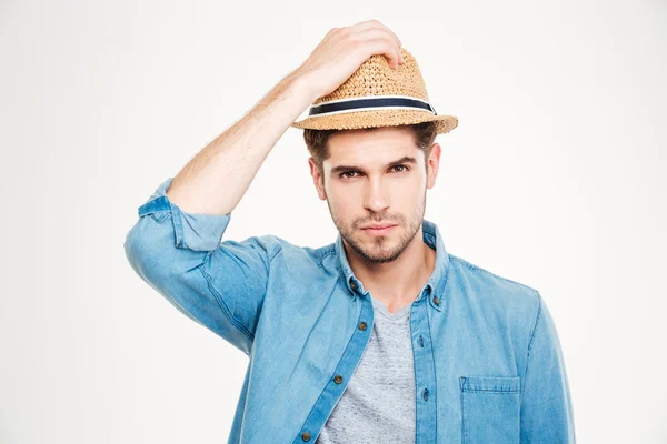 Atractivo joven de cerdas en camisa azul y sombrero — Foto de Stock