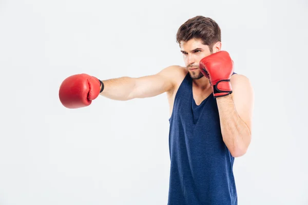 Retrato de un deportista boxeando con guantes rojos — Foto de Stock