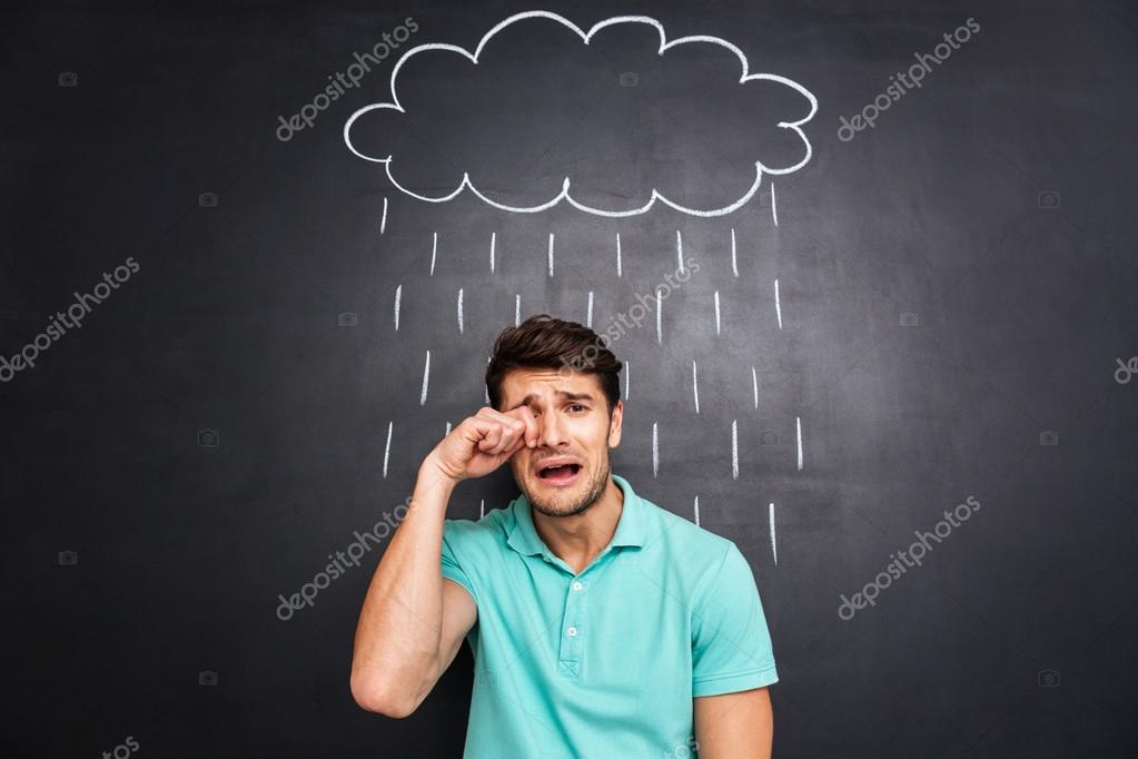 guy crying in rain