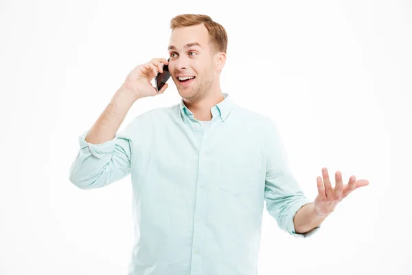 Feliz joven empresario guapo hablando en el teléfono móvil — Foto de Stock