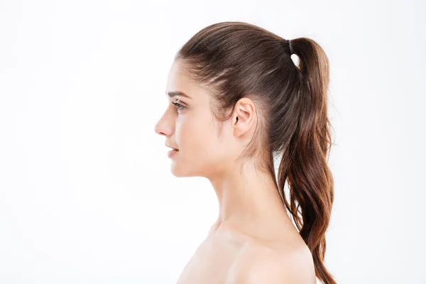 Profile of attractive young woman with ponytail — Stock Photo, Image