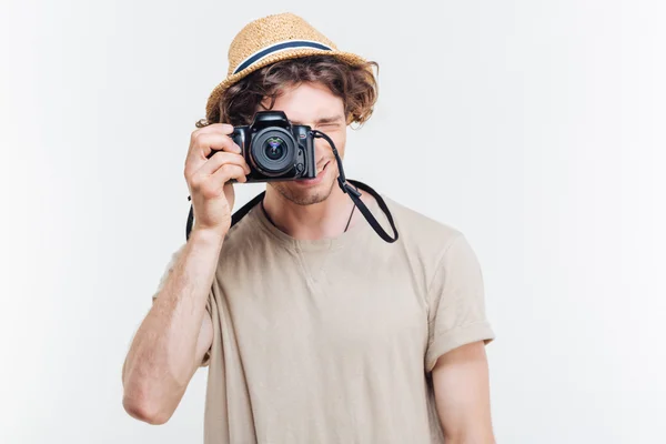 Young man making photo with retro camera — Stock Photo, Image