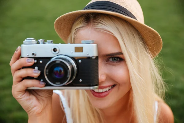 Close up portrait of a girl making photo with camera — Stock Photo, Image