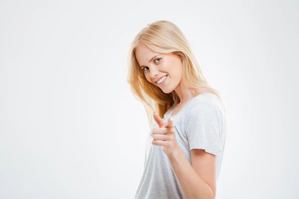 Retrato de una joven mujer feliz señalando con el dedo a la cámara —  Fotos de Stock