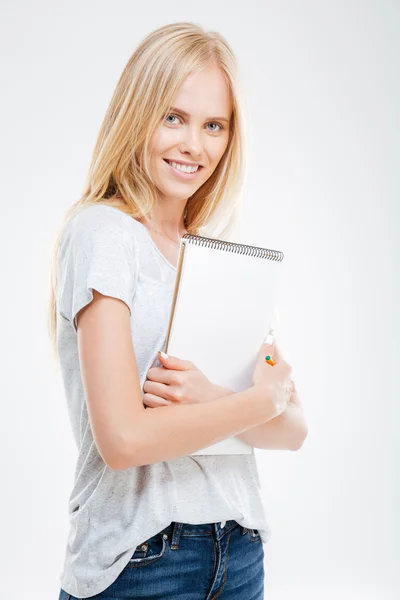 Schöne junge beiläufige Mädchen Notizbuch isoliert — Stockfoto