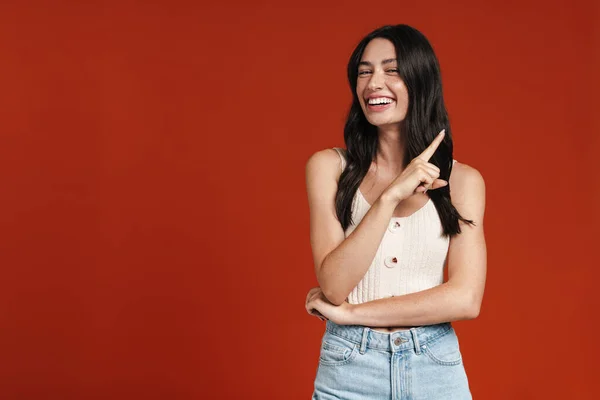 Image Young Happy Woman Smiling Pointing Finger Aside Isolated Red — Stock Photo, Image