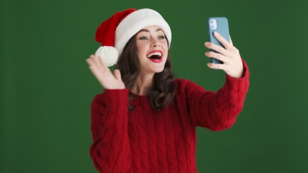 Happy Cheerful Girl Christmas Santa Hat Talking Videocall Mobile Phone — Stock Video