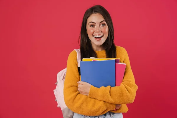 Imagen Hermosa Estudiante Emocionada Posando Con Libros Ejercicios Aislados Sobre — Foto de Stock