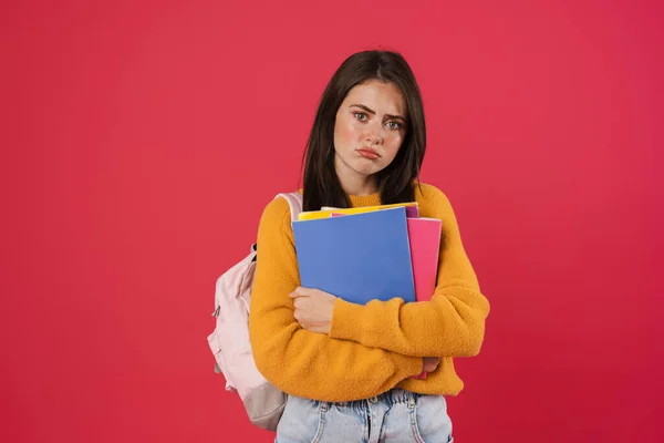 Afbeelding Van Ongelukkige Mooie Student Meisje Poseren Met Oefenboeken Geïsoleerd — Stockfoto