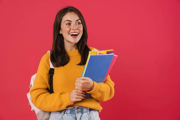 분홍색 격리되어 교과서를 책가방을 여학생 — 스톡 사진