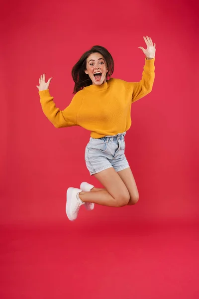 Full Length Portrait Cheerful Woman Jumping Isolated Pink Background — Stock Photo, Image
