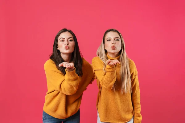 Image Caucasian Beautiful Women Blowing Air Kisses Camera Isolated Pink — Stock Photo, Image