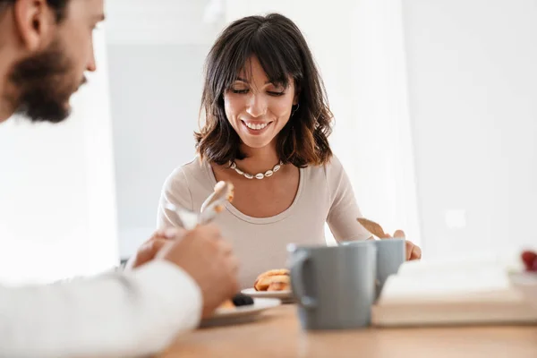 Image Smiling Beautiful Couple Having Breakfast While Reading Book Home — Stock Photo, Image
