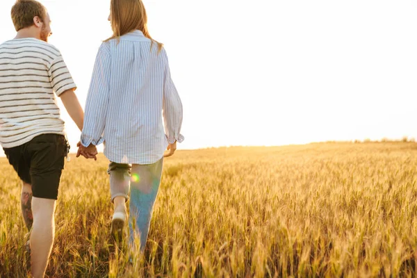 Cropped Picture Young Loving Couple Walking Field Holding Hands Each — Stock Photo, Image