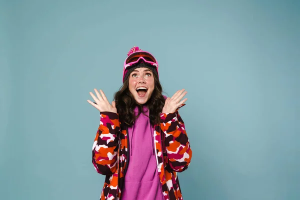 Happy Excited Young Woman Wearing Snowboarding Gear Standing Isolated Blue — Stock Photo, Image