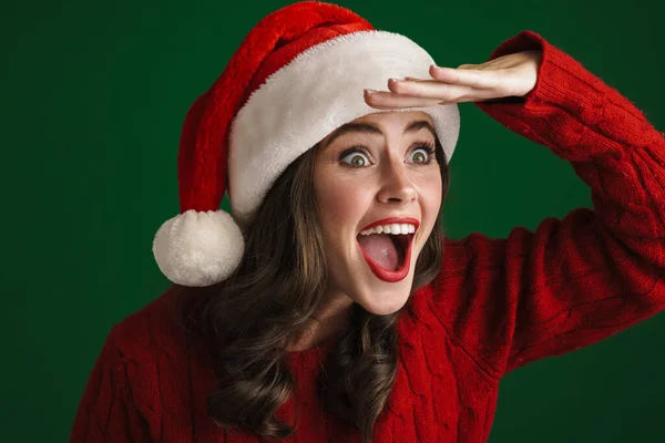 Beautiful Excited Girl Santa Claus Hat Exclaiming Looking Aside Isolated — Stock Photo, Image