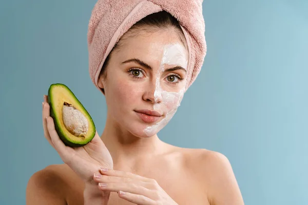 Shirtless Beautiful Girl Nourishing Mask Holding Avocado Isolated Blue Background — Stock Photo, Image