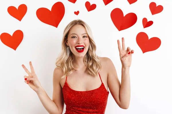 Photo Young Positive Blonde Woman Red Dress Showing Peace Gesture — Stock Photo, Image