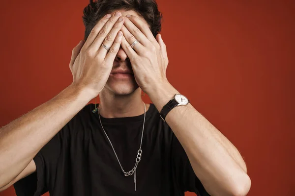 Portrait Confused Man Covering His Face Palm Looking Camera Fingers — Stock Photo, Image