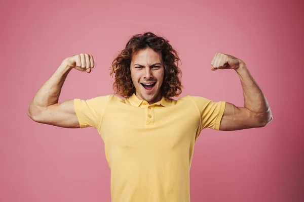 Glad Stilig Kille Ler Och Visar Sina Biceps Isolerade Över — Stockfoto