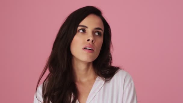 Bored Young Woman Showing Nonsense Gesture Standing Isolated Pink Background — Stock Video