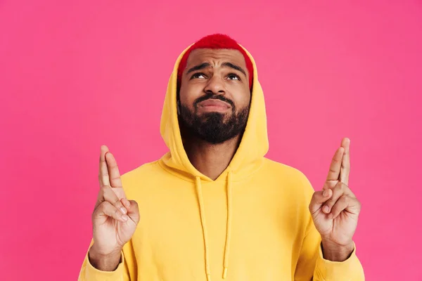 Displeased African American Guy Looking Upward Fingers Crossed Isolated Pink — Stock Photo, Image